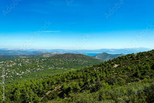 Panoramic view, as seen from the top of the mountain Penteli near Athens, Greece. © akarb