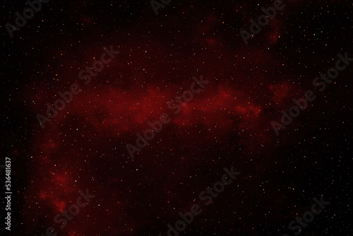 Red galaxy space with stars in heart shape. Starry night sky background. 3D photo of red night sky with stars. Concept of Valentines, Christmas, and New Year.