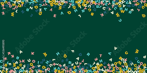 Falling letters of English language. Pastel flying words of Latin alphabet. Foreign languages study concept. Powerful back to school banner on blackboard background.