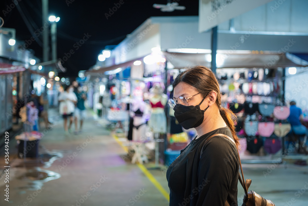 Woman (LGBTQ) posing with food at thai street food