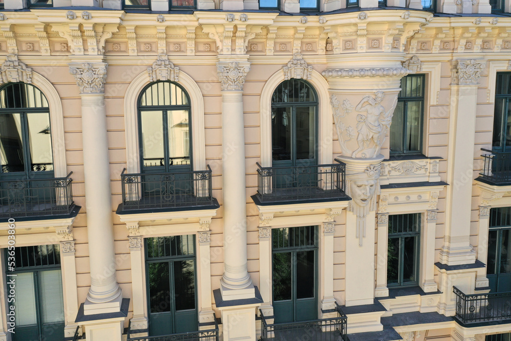 Detail of yellow art nouveau building facade of building in Riga, Latvia, Europe