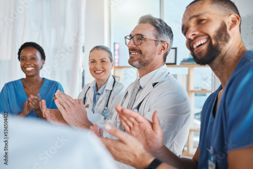 Doctors, nurses and teamwork collaboration clapping after medical presentation, healthcare meeting and hospital medicine success. Smile, happy and excited insurance men and women with winner gesture