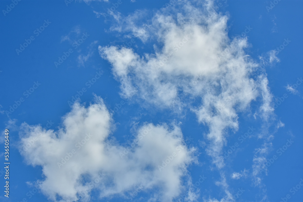 White clouds against blue sky for a backgrounds White clouds against blue sky for a backgrounds
