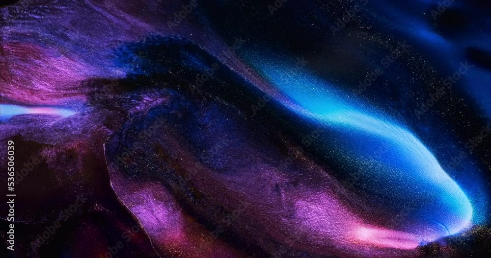 Lilac blue black dark paint abstract background. Dark purple violet ink splash wave spreads closeup. 4k sparkling liquid footage. Glitter Sequins shine in black acrylic fluid art. Space galaxy concept