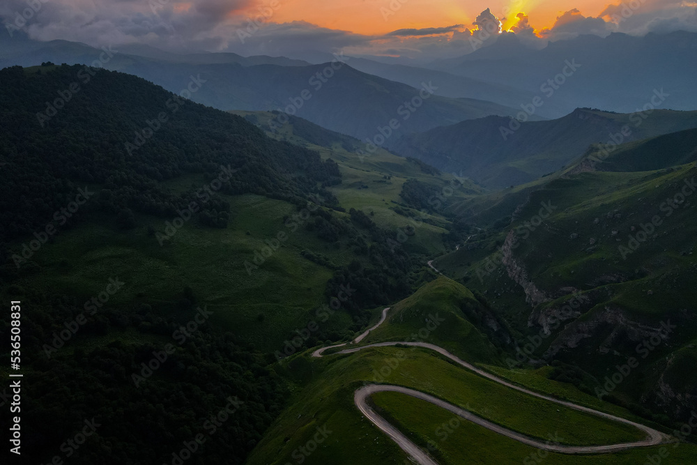Scenic mountain sunrise landscape in mountains of Caucasus