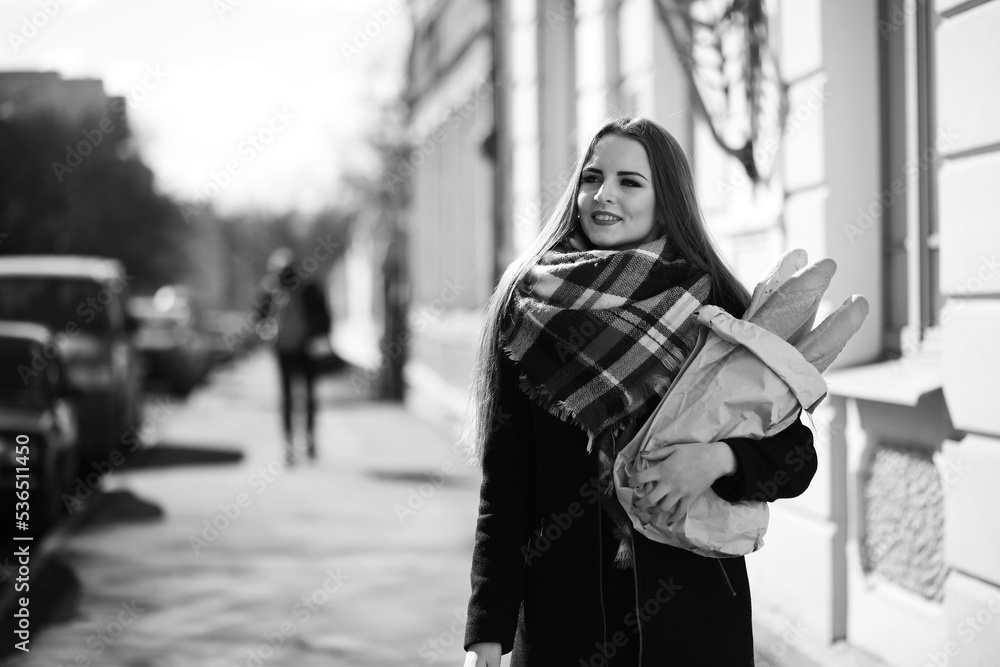 Black and white photo of a young girl on a walk Black and white photo of a young girl on a walk