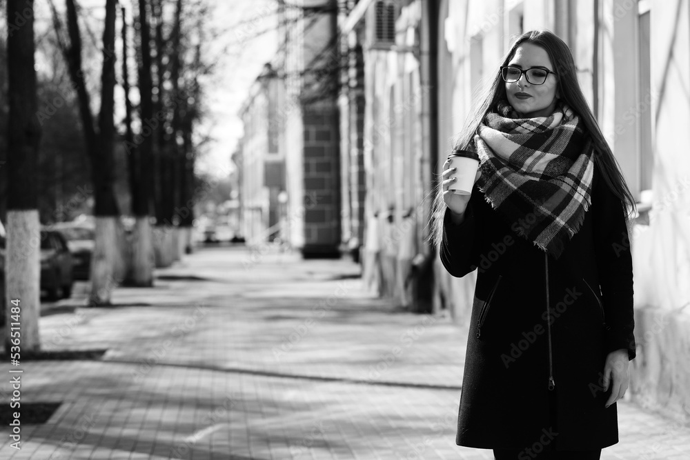 Black and white photo of a young girl on a walk Black and white photo of a young girl on a walk