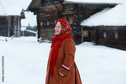 young girls in traditional costumes of the Russian north in winter