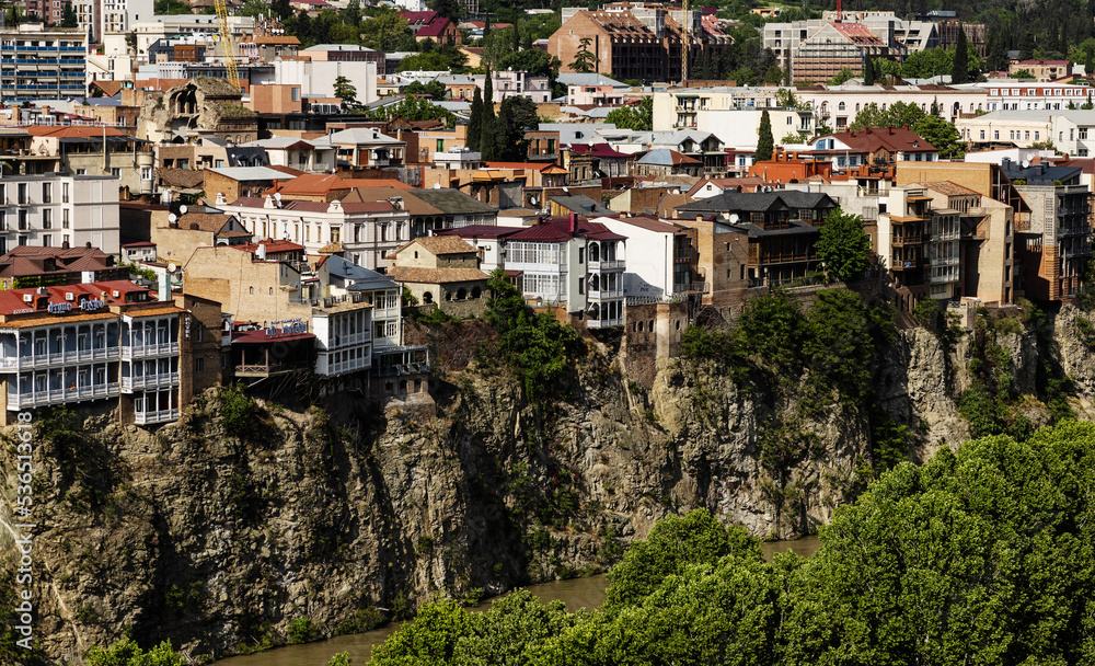 General view on houses on a cliff over Kura river in Tbilisi, Georgia
