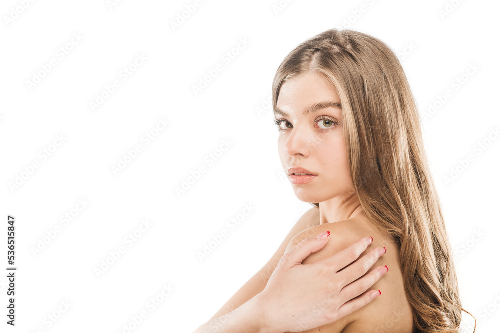 Beautiful girl touching her shoulder and posing in studio on white background,close up Beautiful girl touching her shoulder and posing in studio on white background,close up