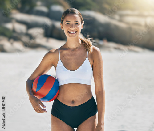 Volleyball, beach and portrait of sports woman with smile, happiness and ready for start of game, competition or workout. Happy, health and athlete girl before fitness, exercise and cardio training