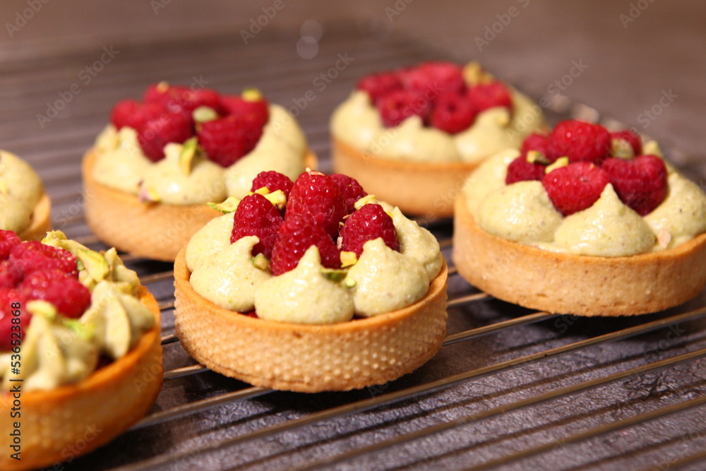 Tarts with raspberry and cream. Pie with meringue. Set of desserts. Set of tarts. Tarts with raspberry and cream. Pie with meringue. Set of desserts. Set of tarts.