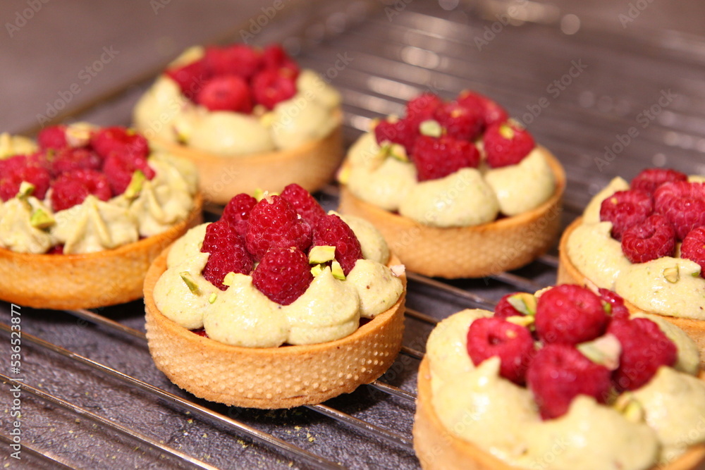Tarts with raspberry and cream. Pie with meringue. Set of desserts. Set of tarts. Tarts with raspberry and cream. Pie with meringue. Set of desserts. Set of tarts.