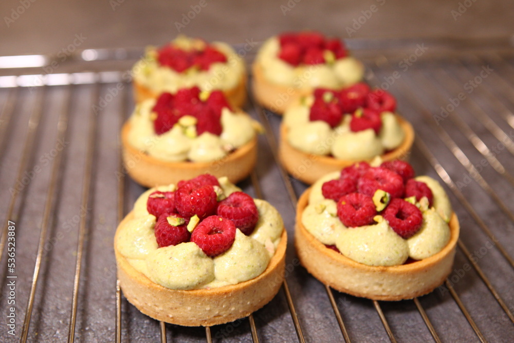 Tarts with raspberry and cream. Pie with meringue. Set of desserts. Set of tarts. Tarts with raspberry and cream. Pie with meringue. Set of desserts. Set of tarts.