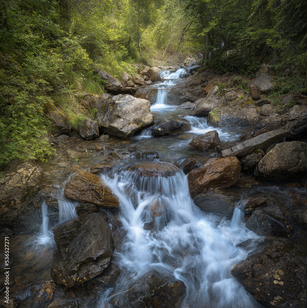 Waterfall at Comapedrosa Natural Park in Andorra Waterfall at Comapedrosa Natural Park in Andorra
