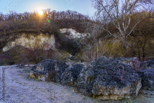 The beauty of winter nature with stones and frost. Background with copy space