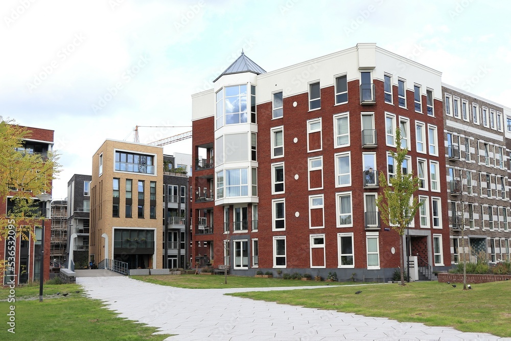 Amsterdam Memeleiland Residential Buildings with Stone Path and Grass, Netherlands Amsterdam Memeleiland Residential Buildings with Stone Path and Grass, Netherlands