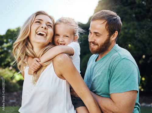 Foto Family, child and outdoor fun in nature with girl, mother and father at park playing and laughing on an adventure