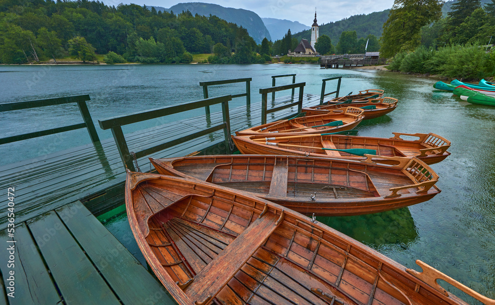Wooden boats on the pier at Bohinj lake