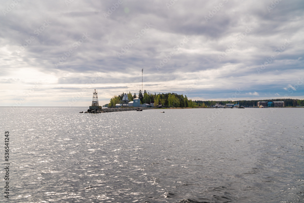 Russia. Leningrad region. May 29, 2022. Lighthouse at the exit to Lake Ladoga from Vladimir Bay.