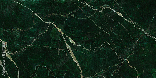 green marble texture background with white curly veins. closeup surface granite stone texture for ceramic wall tile, flooring and kitchen design. polished quartz, quartzite matt limestone.