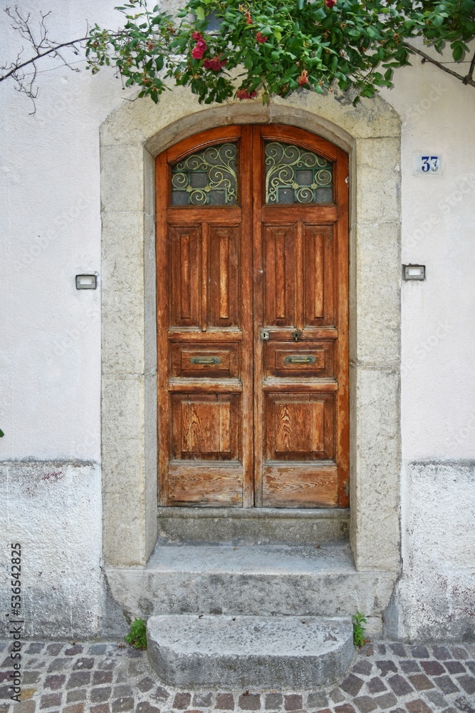 The door of an old house in Pizzone, a medieval village in the Molise region of Italy. The door of an old house in Pizzone, a medieval village in the Molise region of Italy.