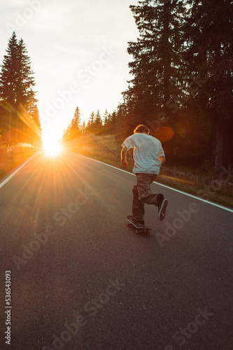 skateboarding in the mountains during sunset