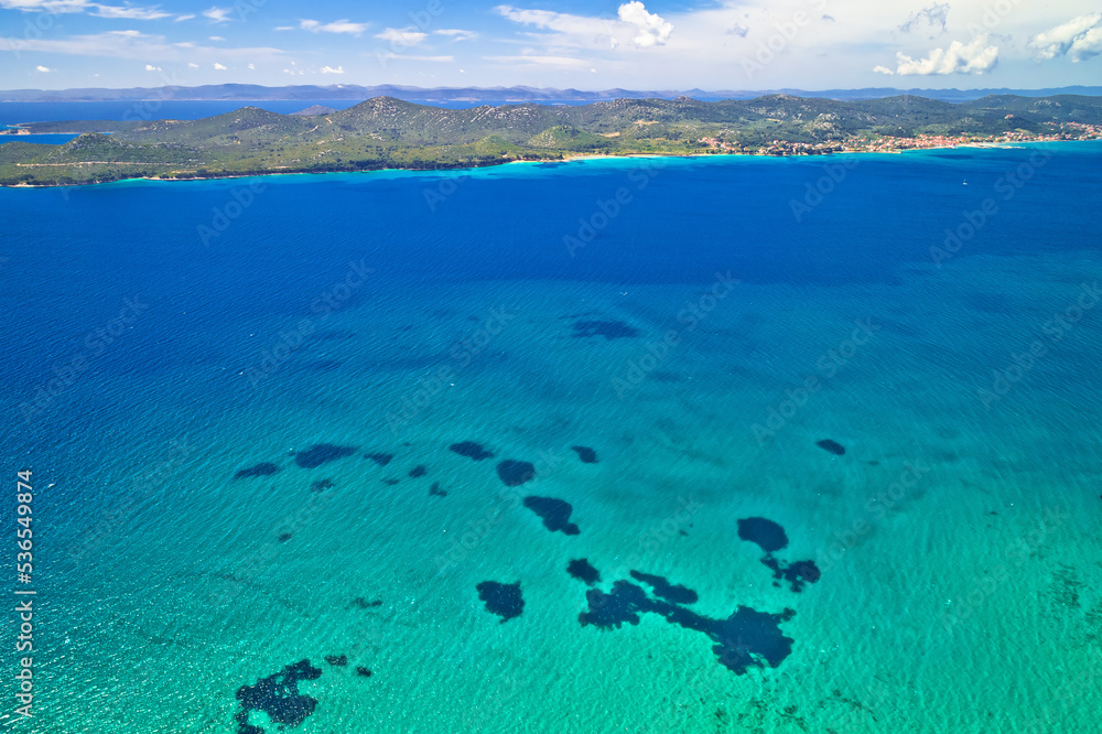 Island of Pasman and turquoise sea aerial view
