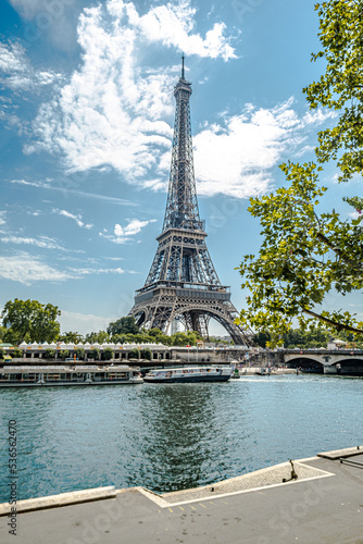 The famous Eiffel Tower in Paris with a dramatic sky