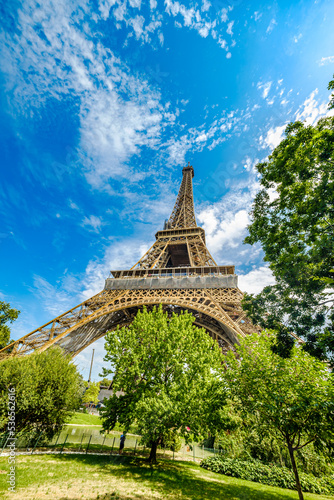 The famous Eiffel Tower in Paris with a dramatic sky