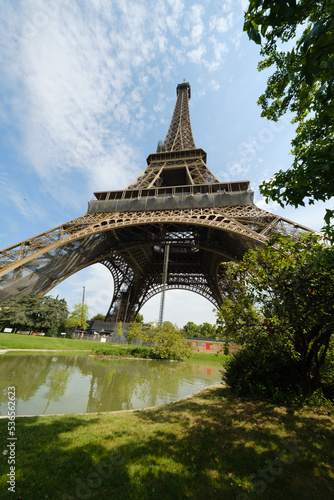 The famous Eiffel Tower in Paris with a dramatic sky