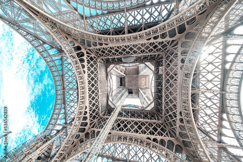 The famous Eiffel Tower in Paris with a dramatic sky