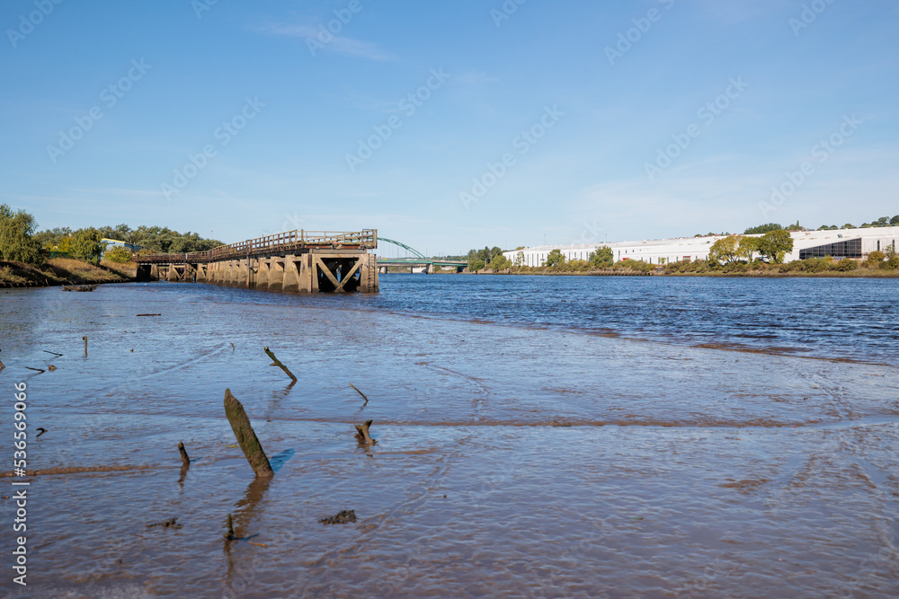 Blaydon England: 17th Sept 2022: View of derwenthaugh staithes view on the River Tyne at low tide sunyn day Blaydon England: 17th Sept 2022: View of derwenthaugh staithes view on the River Tyne at low tide sunyn day
