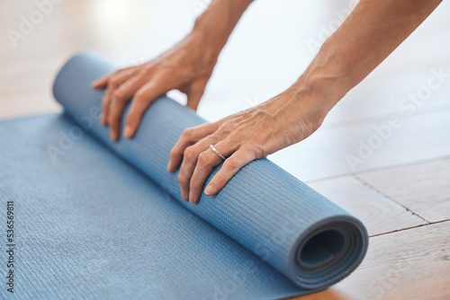 Hands  floor and yoga mat in relax fitness  workout and training in pilates  zen and peace studio. Zoom  woman and yogi ready for wellness meditation  holistic body exercise and chakra energy balance