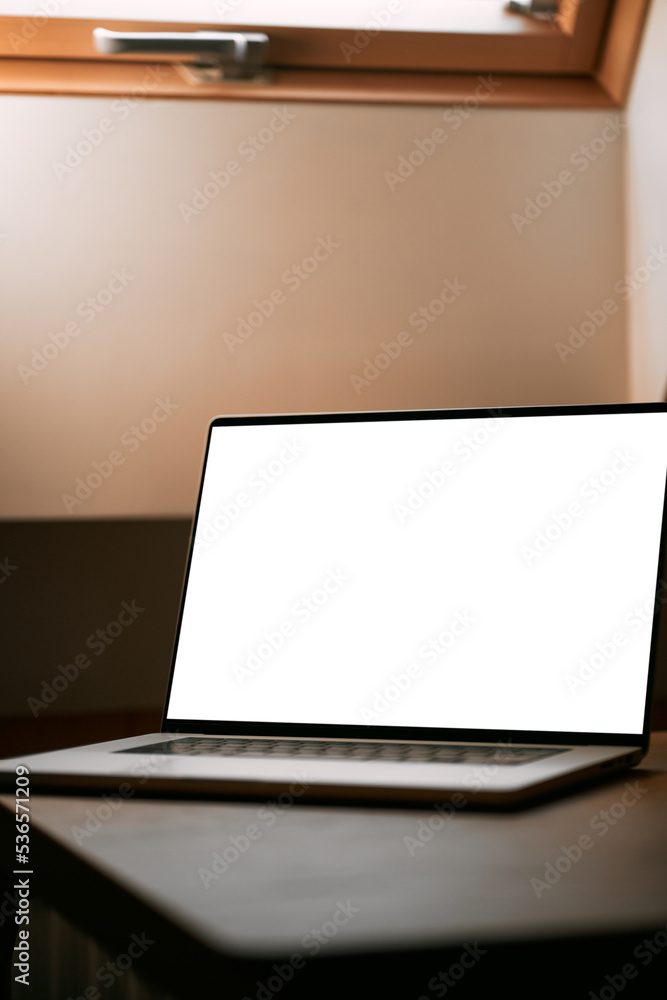 Top view of an open modern laptop blank screen or notebook isolated on table. free space for your copy, view from top. Top view of an open modern laptop blank screen or notebook isolated on table. free space for your copy, view from top.