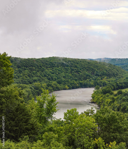 Looking out over the White River from the top of a mountain as the morning fog is lifting giving way to a beautiful view in Cotter, Arkansas 