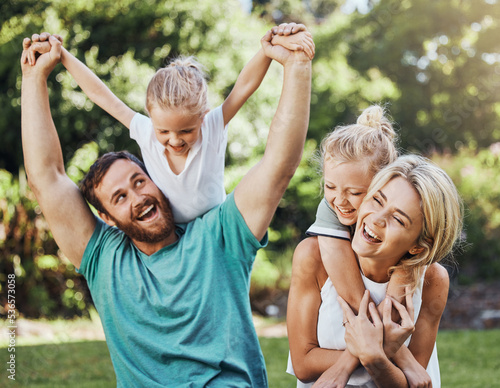 Photos Love, happy and family playing in a park, laugh and relax while having fun together