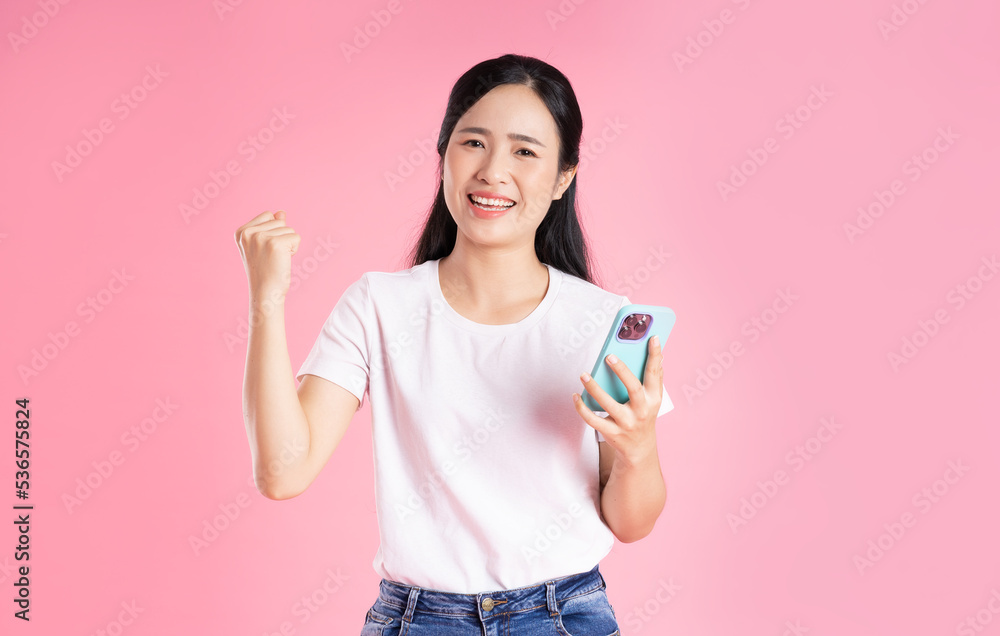 beautiful asian girl portrait, isolated on pink background beautiful asian girl portrait, isolated on pink background