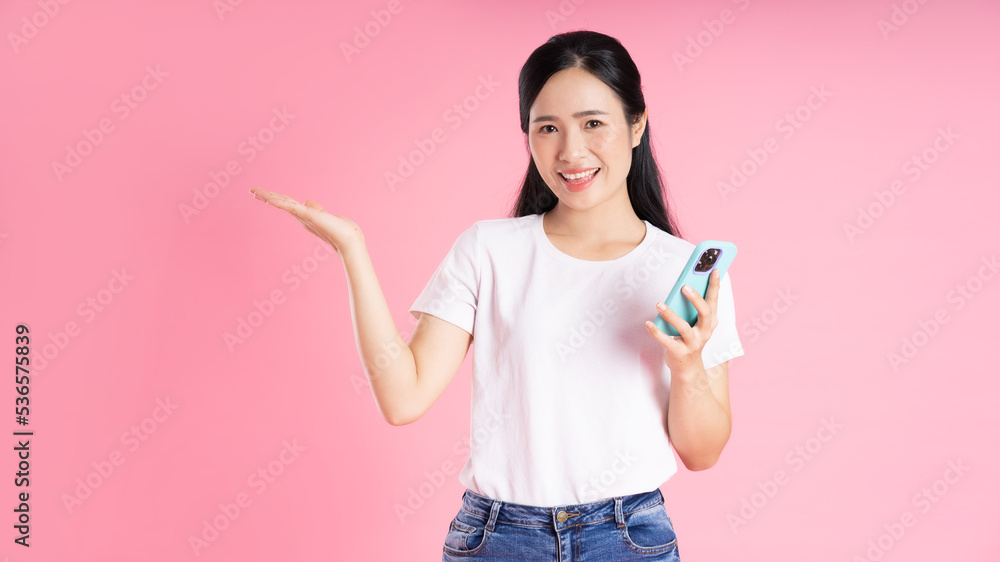 beautiful asian girl portrait, isolated on pink background beautiful asian girl portrait, isolated on pink background