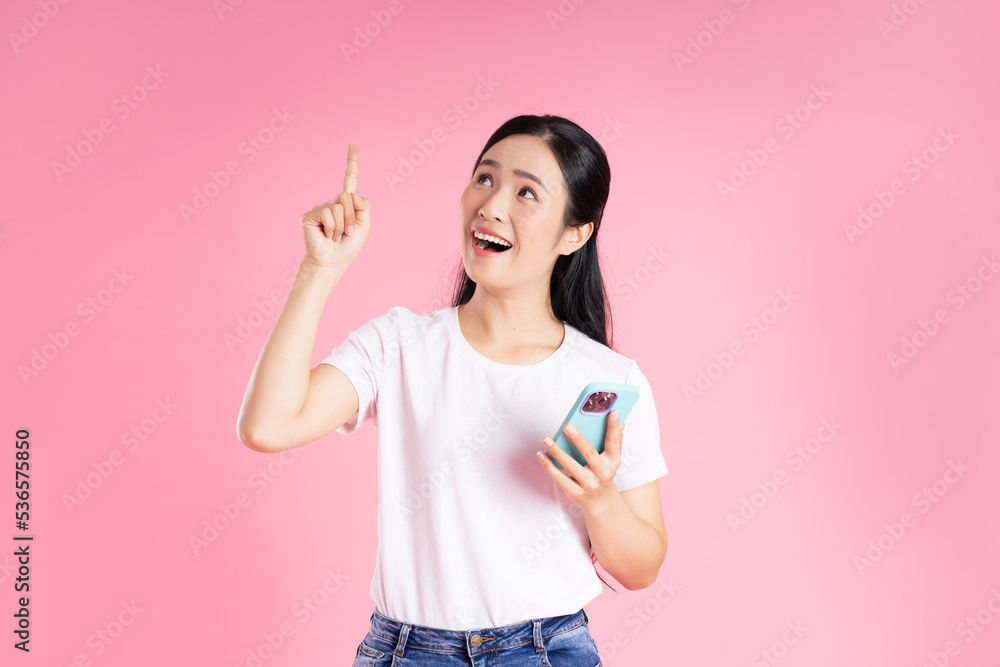 beautiful asian girl portrait, isolated on pink background beautiful asian girl portrait, isolated on pink background