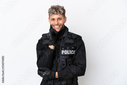 SWAT caucasian man isolated on white background smiling © luismolinero