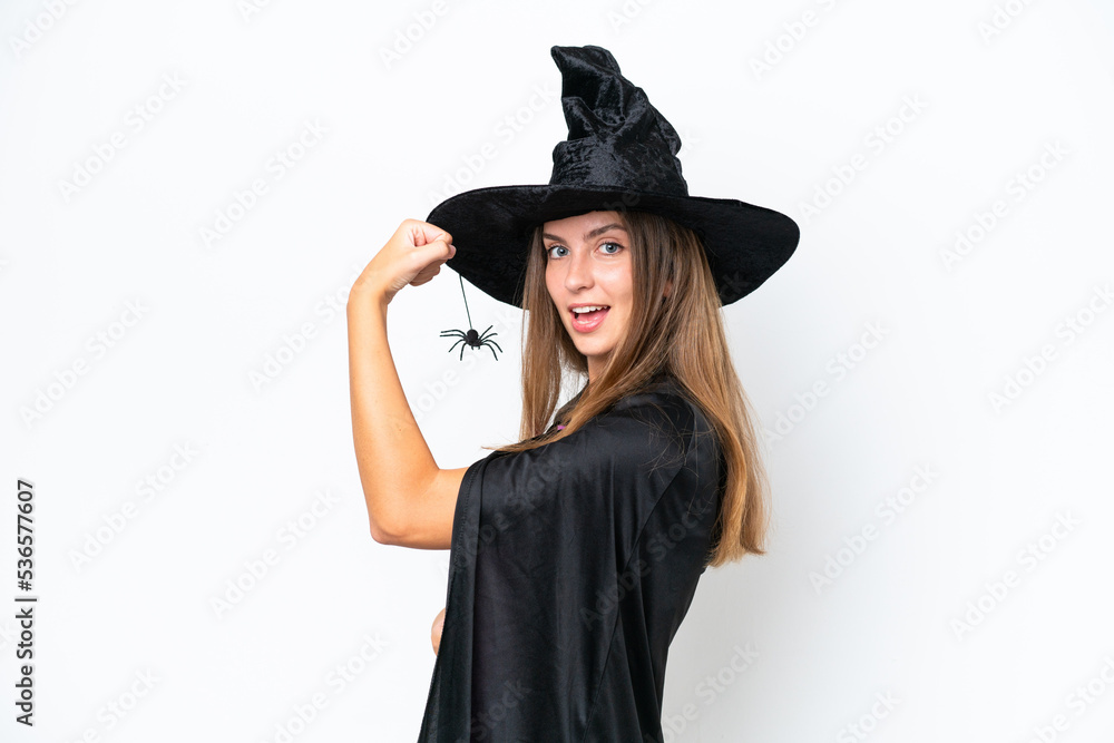 Young caucasian woman costume as witch isolated on white background doing strong gesture Young caucasian woman costume as witch isolated on white background doing strong gesture