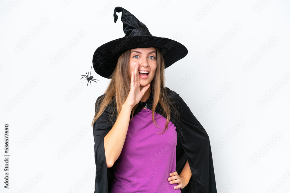 Young caucasian woman costume as witch isolated on white background shouting with mouth wide open Young caucasian woman costume as witch isolated on white background shouting with mouth wide open