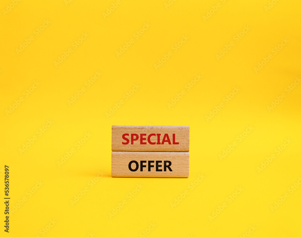 Special offer symbol. Concept word Special offer on wooden blocks. Beautiful yellow background. Business and Special offer concept. Copy space Special offer symbol. Concept word Special offer on wooden blocks. Beautiful yellow background. Business and Special offer concept. Copy space