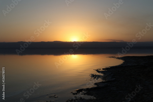 Fototapeta Naklejka Na Ścianę i Meble -  landscape view of coastline of dead sea at sunset