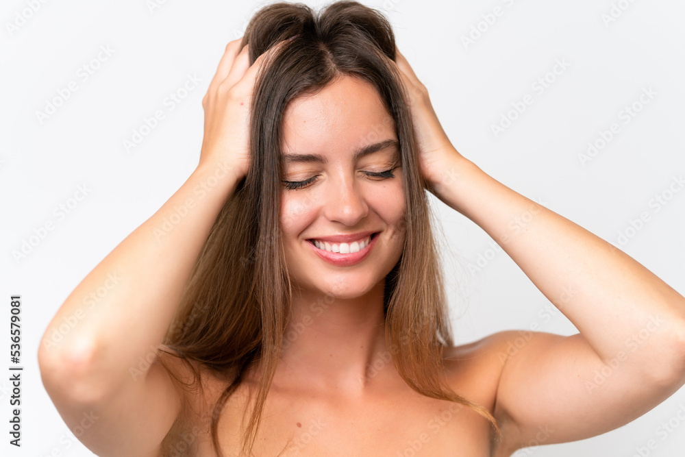 Young caucasian woman isolated on white background with happy expression. Close up portrait