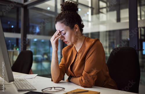 Fotografía Woman working at night with headache, burnout and stress over social media marketing project or company deadline