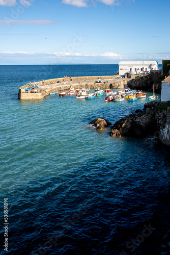 The harbour and fishing boats at Coverack in Cornwall photo