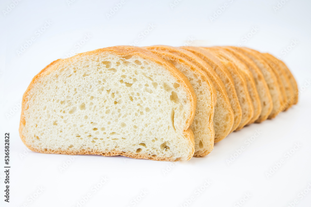 sliced loaf of bread on a white