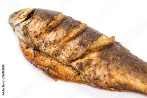 fried or oven baked whole fish isolated